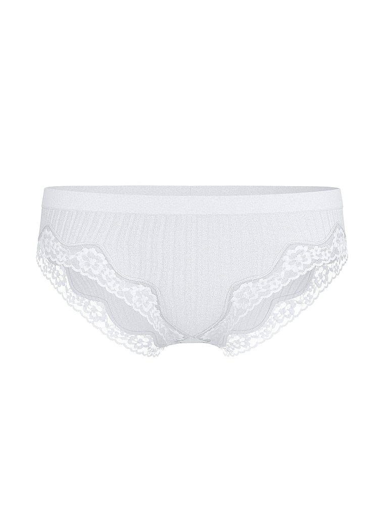 Chiloți cu dantelă pe marginile bikinilor cu nervuri fără cusături. Produsul este alb și provine din colecția Seamning.