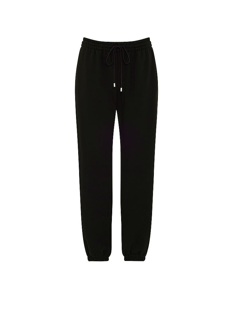 Pantaloni de trening din bumbac în afara serviciului. Produsul este negru și provine din colecția Angel Essentials.