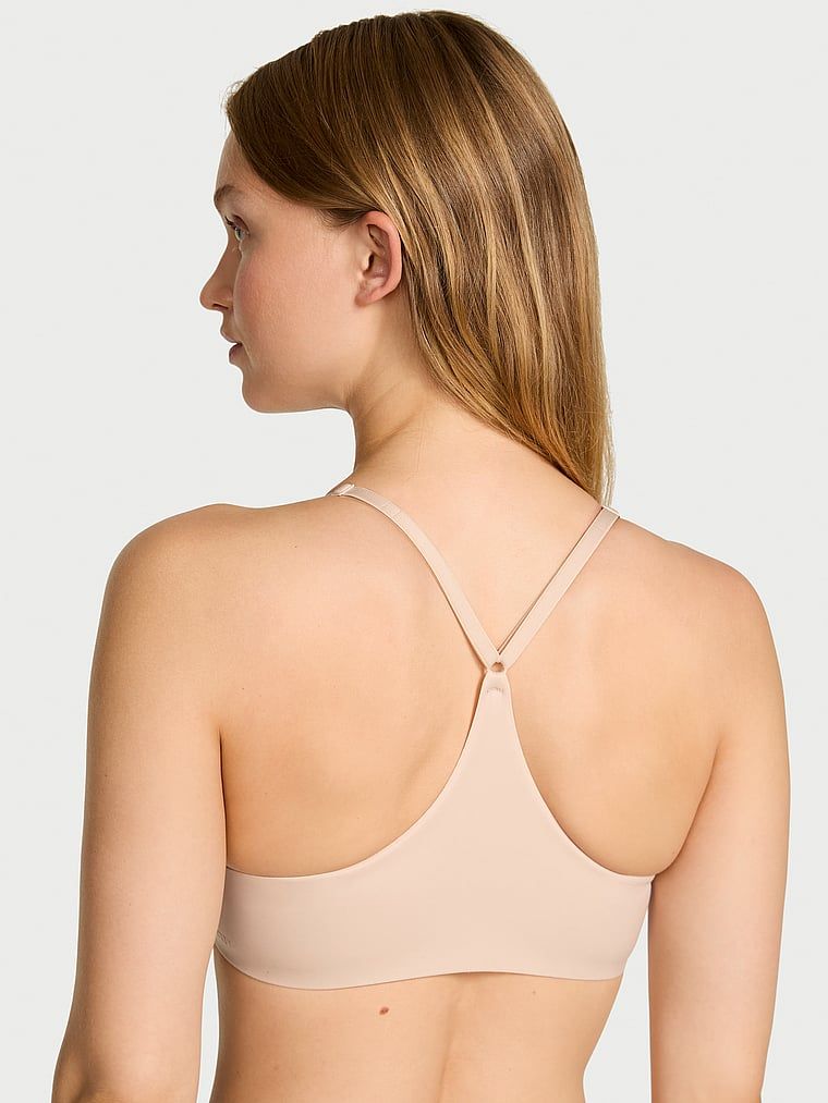 Sutien ușor căptușit închis în față. Produsul este de culoare bej și provine din colecția Body by Victoria.