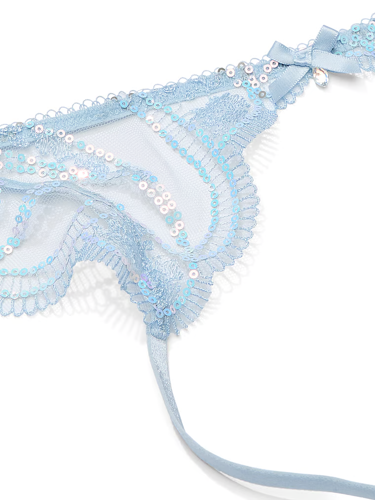 Portjartieră de broderie iridescentă. Produsul este modelat și provine din colecția Dream Angels.