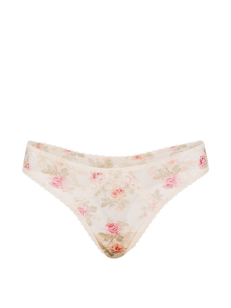 Strălucire pură, tanga strălucitoare. Produsul are o culoare florală și provine din colecția Dream Angels.