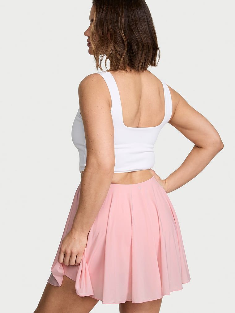 Fustă sport de tenis cu pantaloni scurți VSX Elevate Sheer Radiance. Produsul este roz și provine din colecția VSX.