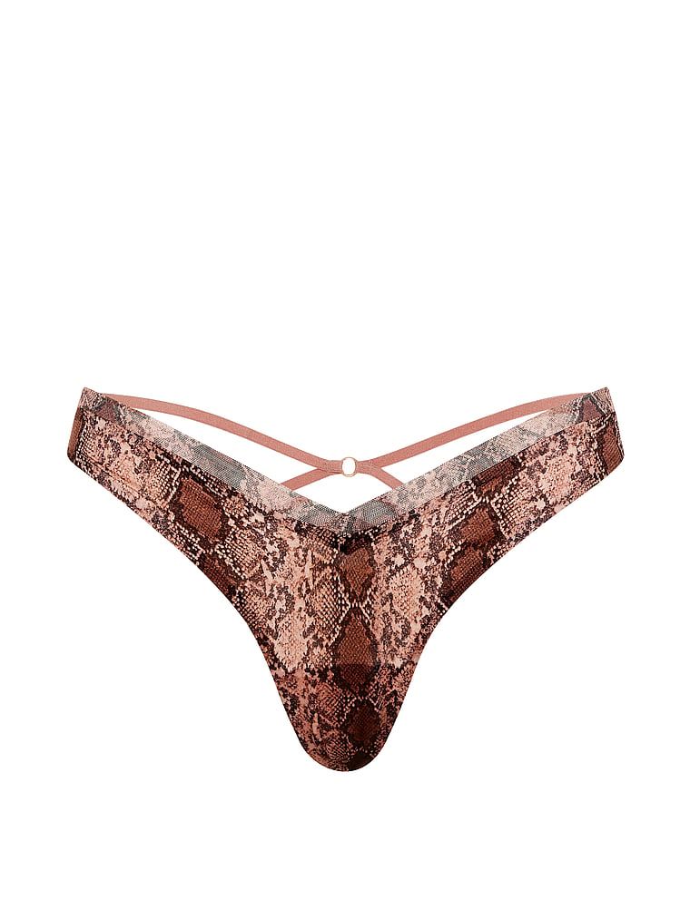 Tanga cu bretele pe spatele Sheer Reveal. Produsul are o culoare cu model și provine din colecția Very Sexy.