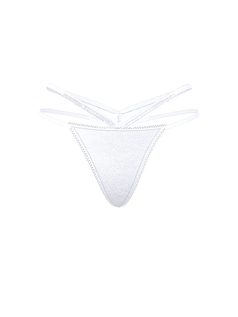 Tanga cu dantelă și decupaje pe laterale. Produsul este de culoare albă și provine din colecția Very Sexy.