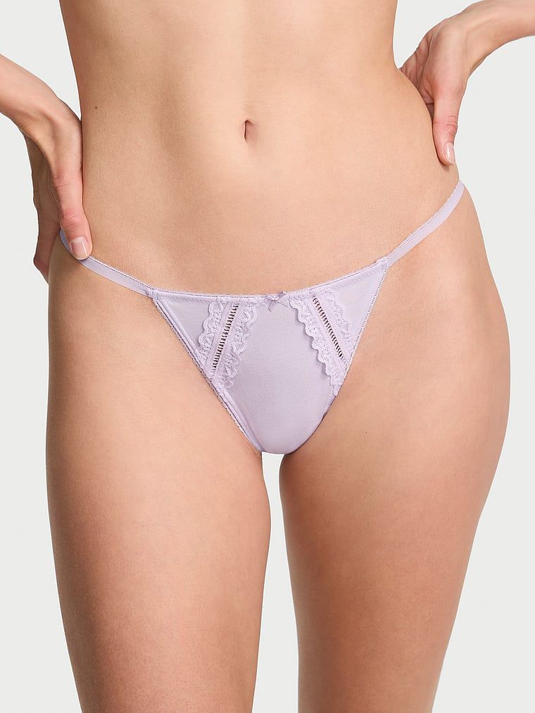 Tanga de bumbac cu inserții Lace-Trim. Produsul este de culoare mov și provine din colecția Victoria's Secret.