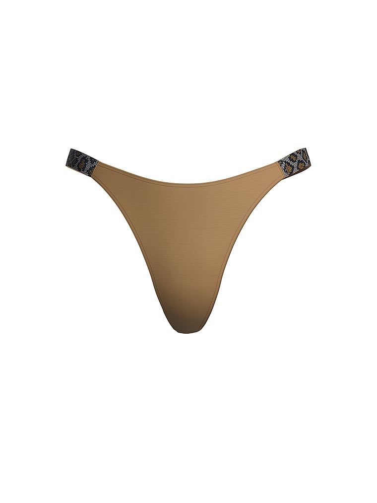 Tanga cu curele lucioase Shine Strap. Produsul este de culoare maro și provine din colecția Very Sexy.