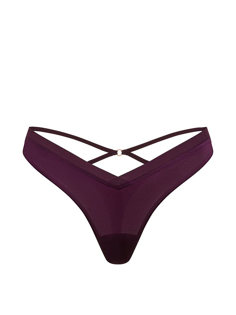 Tanga cu bretele la spatele Sheer Reveal. Produsul este de culoare mov și provine din colecția Very Sexy.