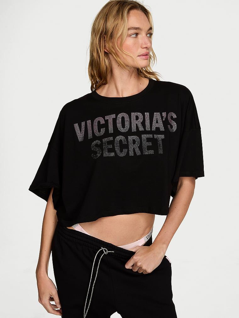 Tricou scurt din bumbac, supradimensionat, cu logo-ul brandului. Produsul este negru și provine din colecția Angel Essentials.