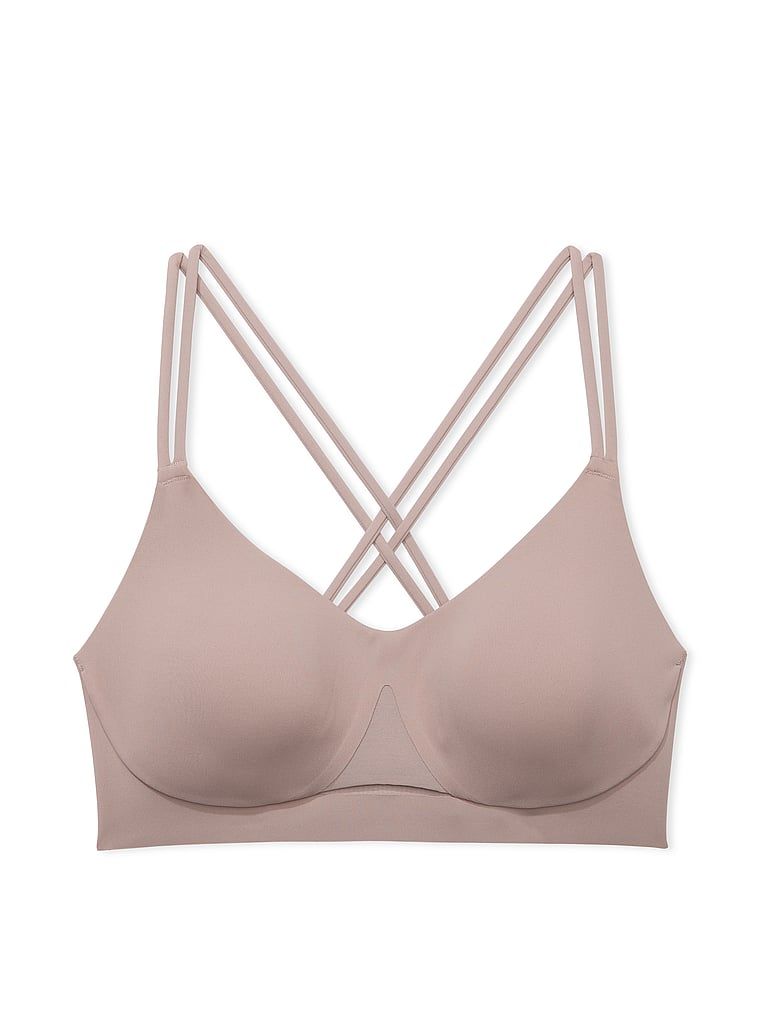 Sutien sport cu suport ușor Elevate Strappy. Produsul este bej și provine din colecția VSX.