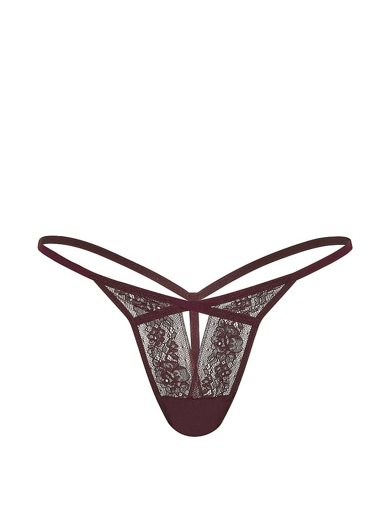 Tanga cu decupaj și dantelă cu bretele. Produsul este de culoare mov și provine din colecția Very Sexy.