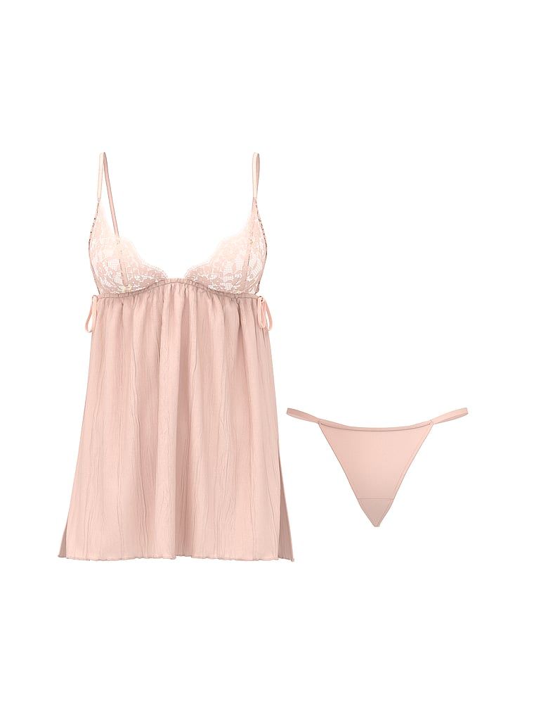 Juponă plisată Babydoll și tanga. Produsul este roz și provine din colecția Dream Angels.