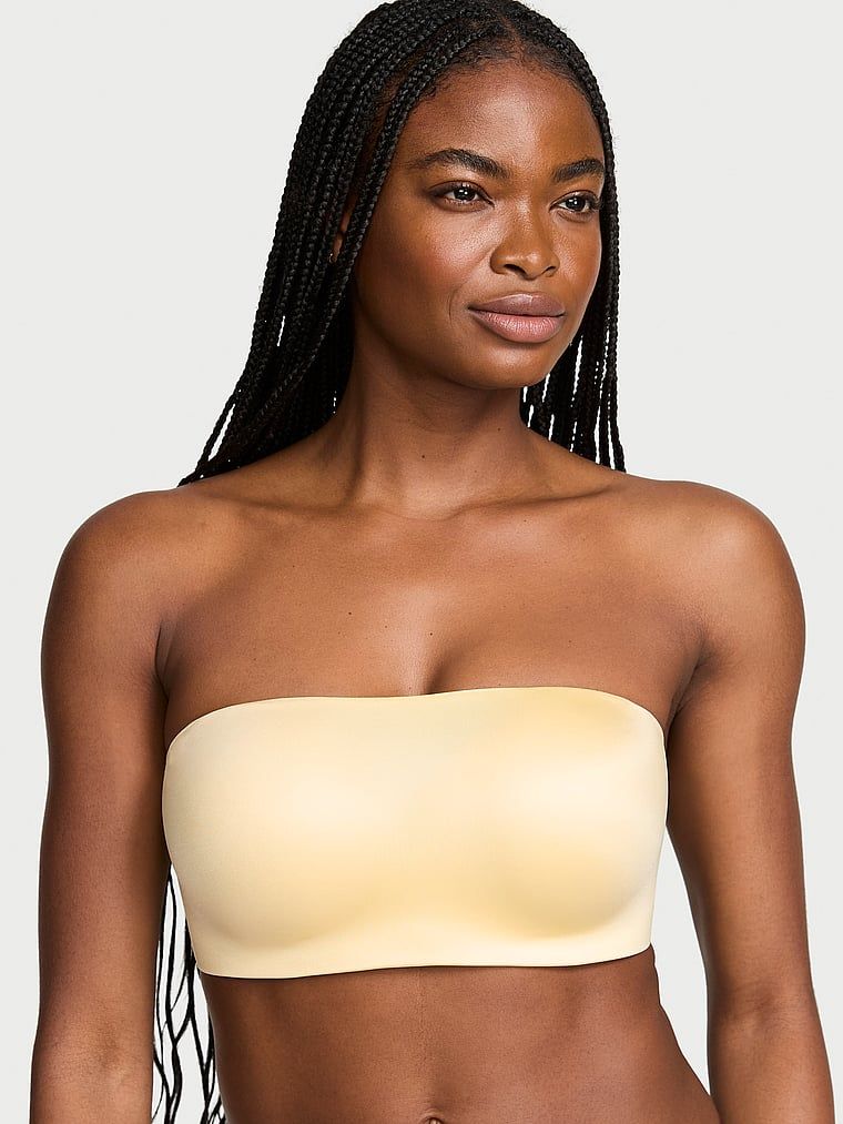 Bandeau fără bretele și sutien push-up cu sârmă. Produsul este de culoare galbenă și provine din colecția Invisible by Victoria's Secret.