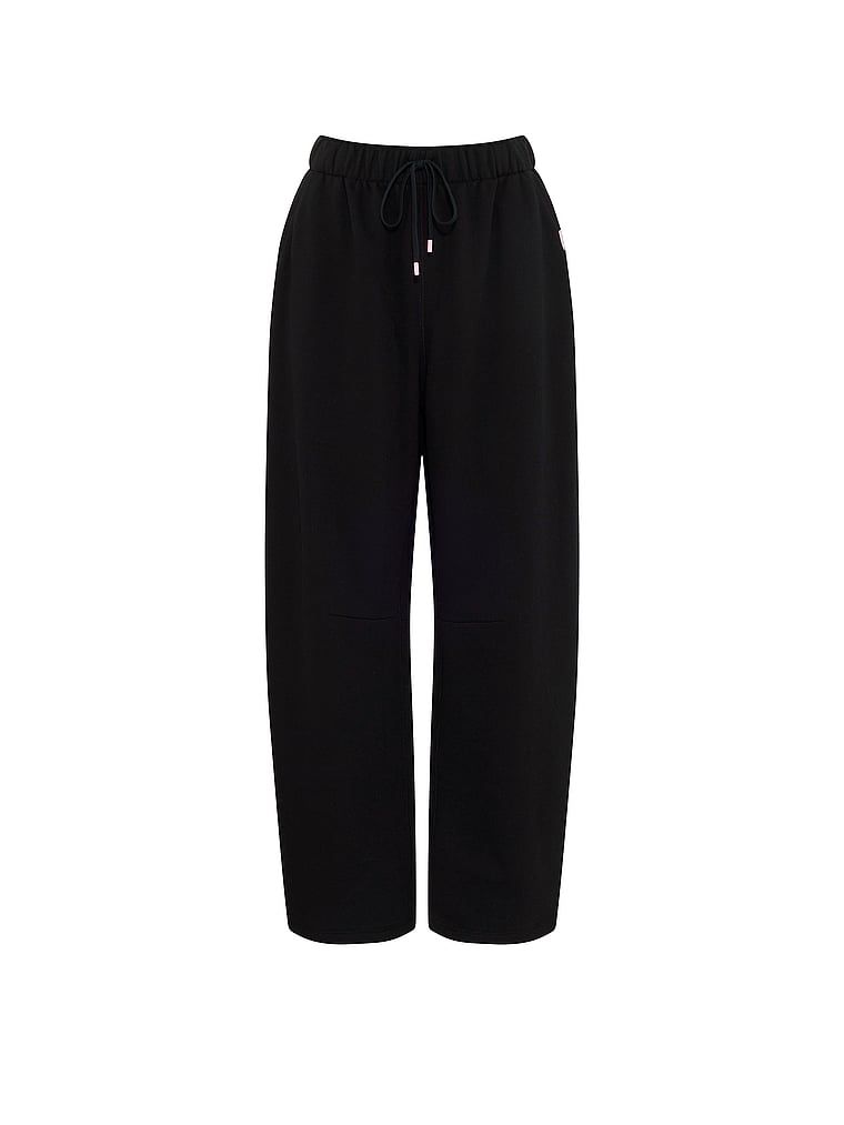 Pantaloni de trening vintage din bumbac. Produsul este negru și provine din colecția Angel Essentials.