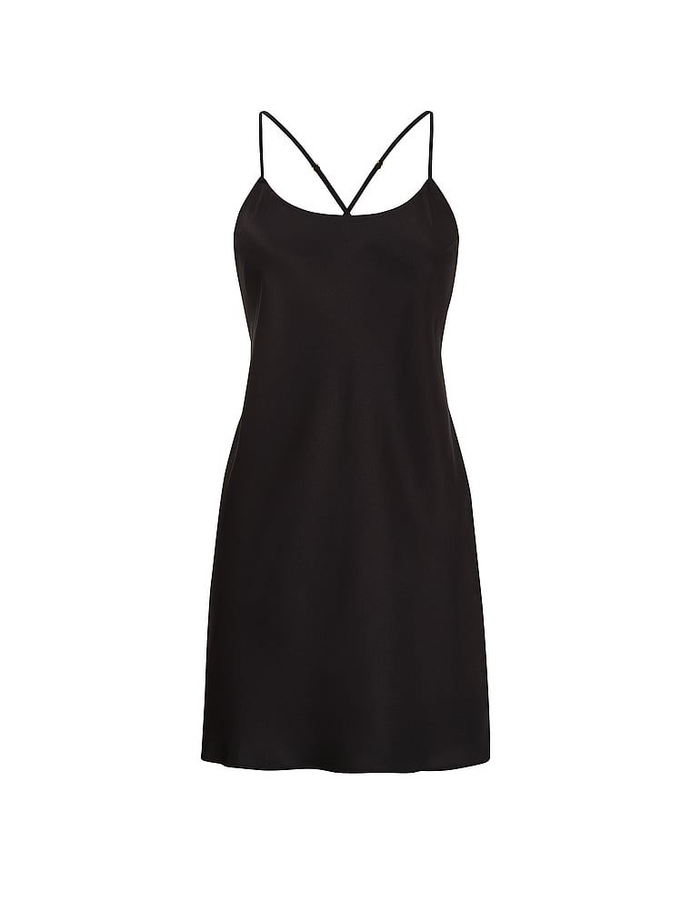Cămașă de noapte din satin cu bretele subțiri care dezvăluie spatele Open-Back Slip. Produsul este negru și provine din colecția Victoria's Secret.