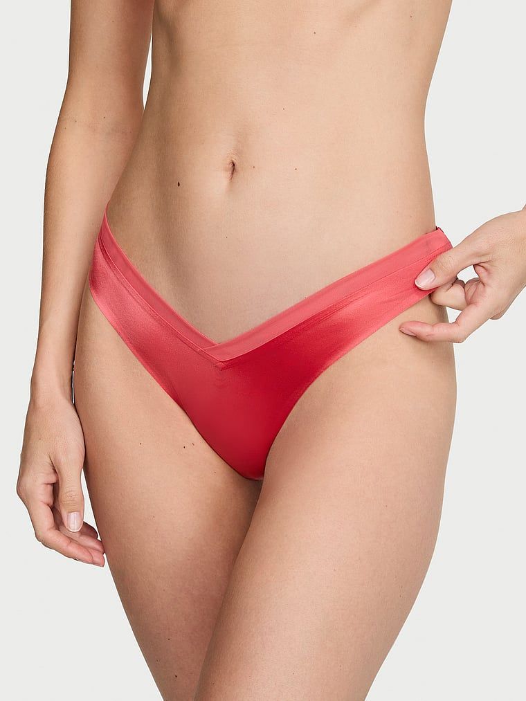 Tanga cu curele pe spatele Sheer Reveal. Produsul este roz și provine din colecția Very Sexy.