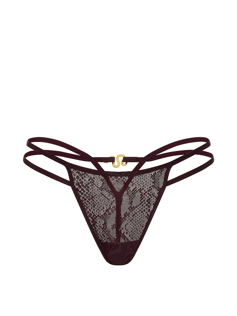 Tanga din dantelă cu un șarpe Viper decorativ. Produsul este de culoare mov și provine din colecția Very Sexy.