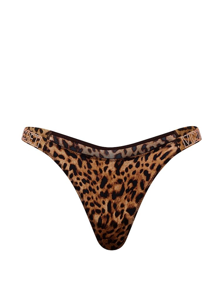 Tanga cu curele lucioase Shine Strap. Produsul are o culoare cu model și provine din colecția Very Sexy.