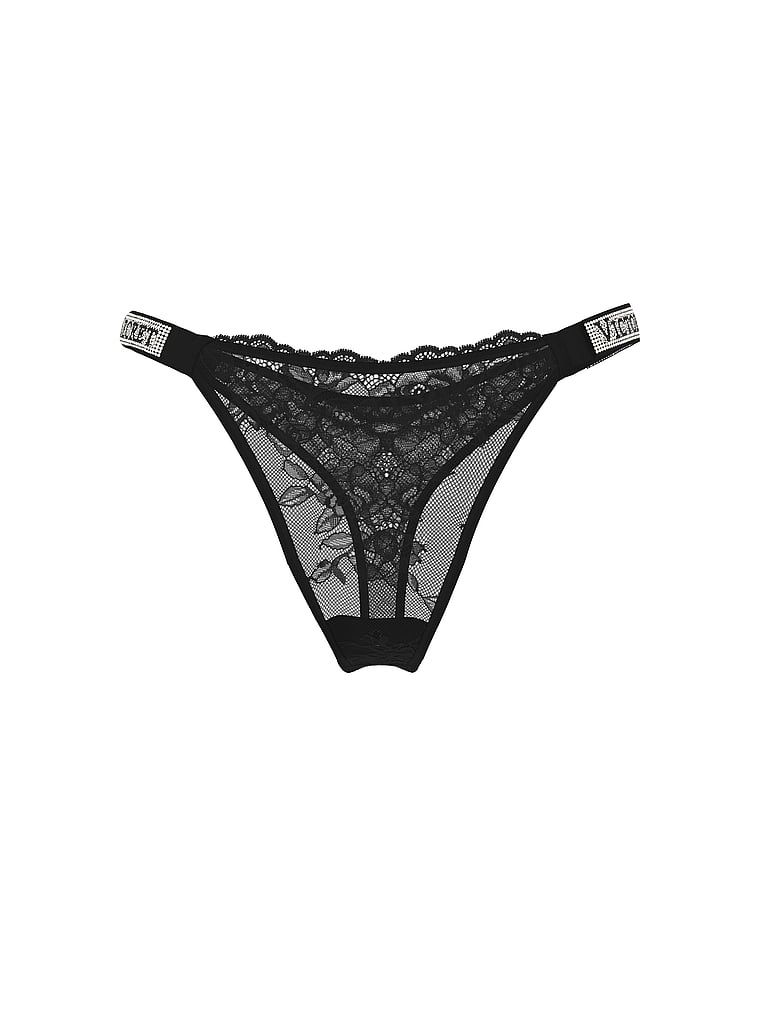 Tanga din dantelă cu curele strălucitoare Shine Strap Produsul este negru și provine din colecția Very Sexy.