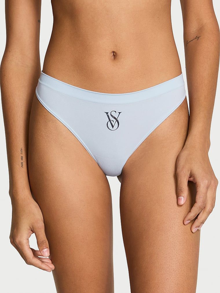 Tanga fără cusături cu logo strălucitor Sparkle. Produsul este de culoare albastră și provine din colecția Seamless