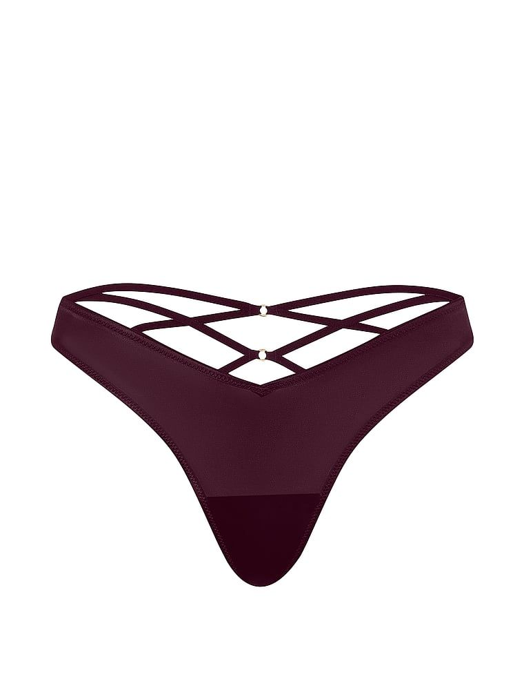 Tanga cu bretele la spate și picior înalt cu strappy-back. Produsul este de culoare mov și provine din colecția Very Sexy.