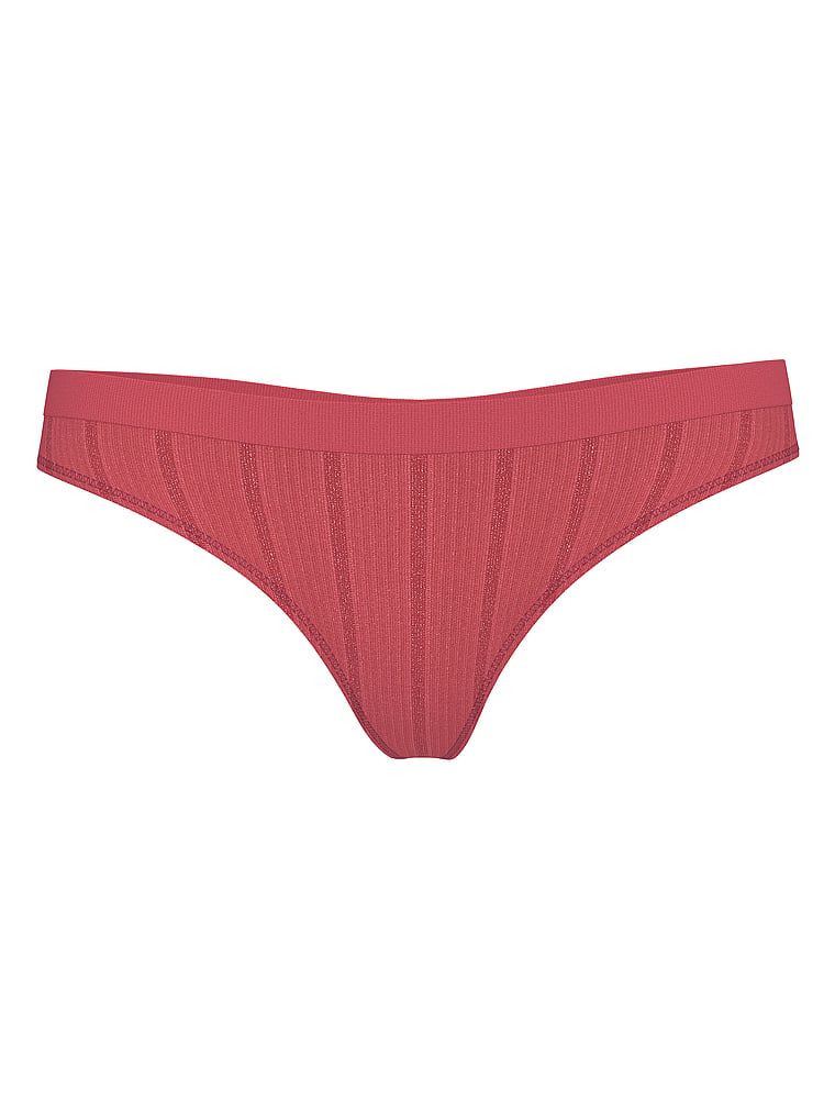Tanga fără cusături. Produsul este auriu și provine din colecția Seamning.