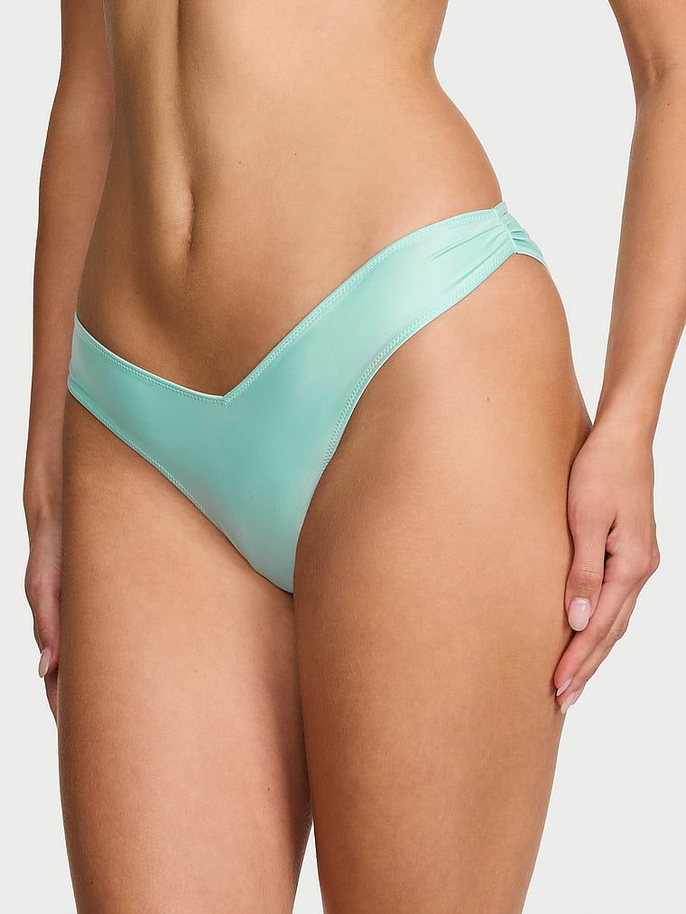 Chiloți brazilieni brazilieni cu spate cu fundă. Produsul este albastru și provine din colecția Dream Angels.