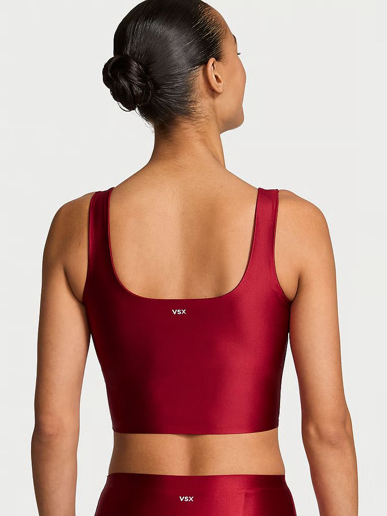 Top sport din material lucios VSX GlossyTech. Produsul este de culoare roșie și provine din colecția VSX.