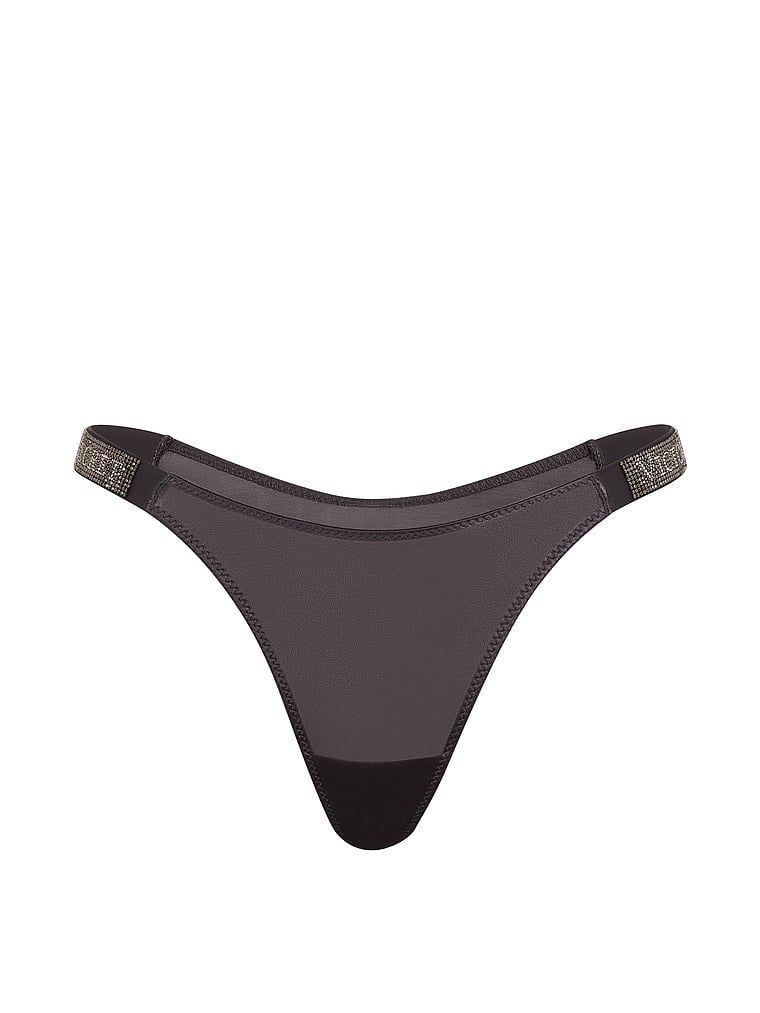 Tanga cu curele lucioase Shine Strap. Produsul este de culoare gri și provine din colecția Very Sexy.