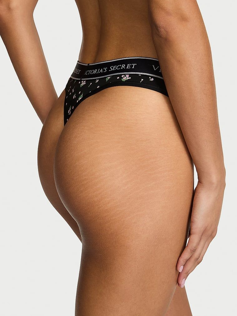 Tanga de bumbac cu logo la talie. Produsul are un model floral și provine din colecția Bumbac.