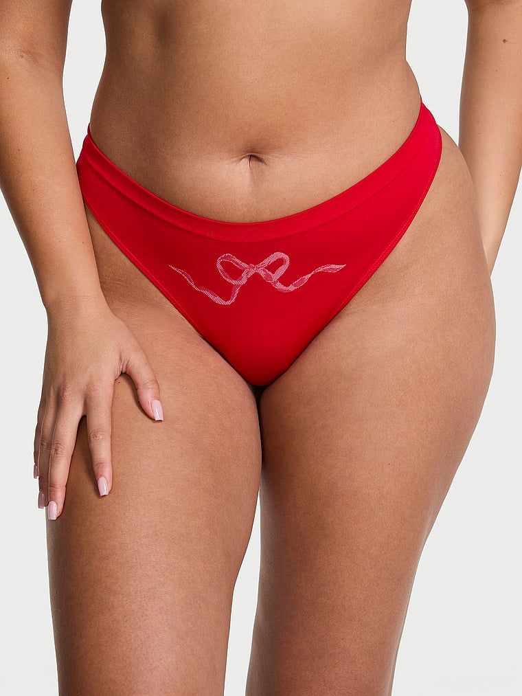 Tanga cu arc fără sudură. Produsul este de culoare roșie și provine din colecția Seamless