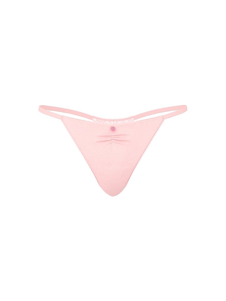 Tanga de bumbac cu dantelă la spate, dantelă în formă de inimă. Produsul este roz și provine din colecția Victoria's Secret.