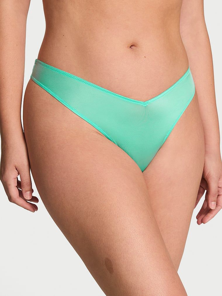 Tanga cu bretele la spate și picior înalt cu strappy-back. Produsul este de culoare albastră și provine din colecția Very Sexy.