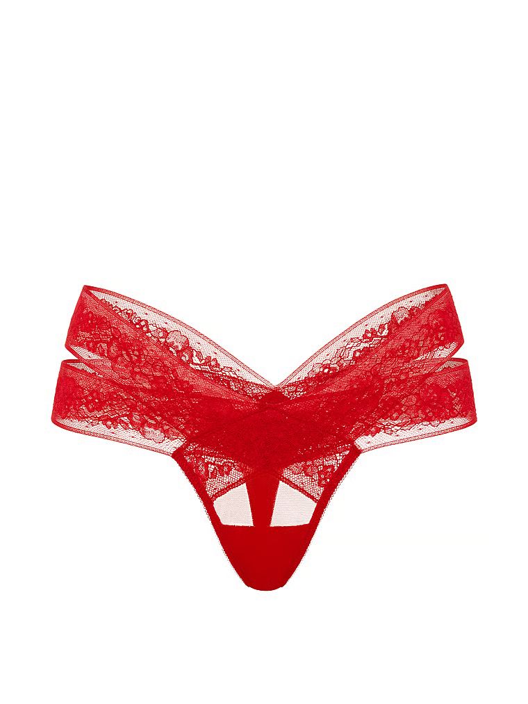 Tanga cu decupaje și dantelă cu bretele. Produsul este roșu și provine din colecția Very Sexy.