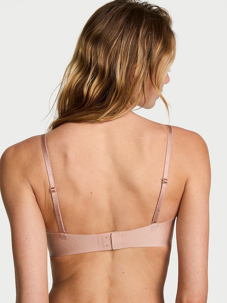 Sutien pushless fără bretele Uplift. Produsul este de culoare bej și provine din colecția Invisible by Victoria's Secret.