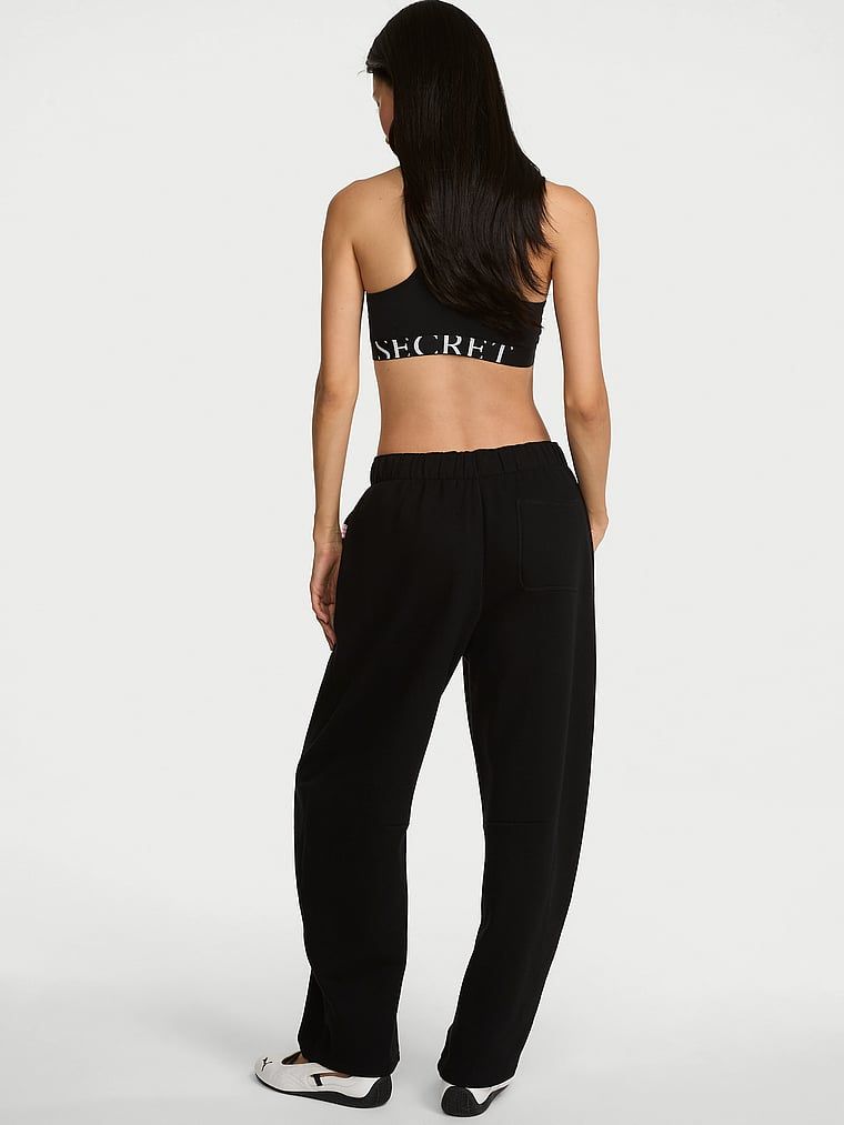 Pantaloni de trening vintage din bumbac. Produsul este negru și provine din colecția Angel Essentials.