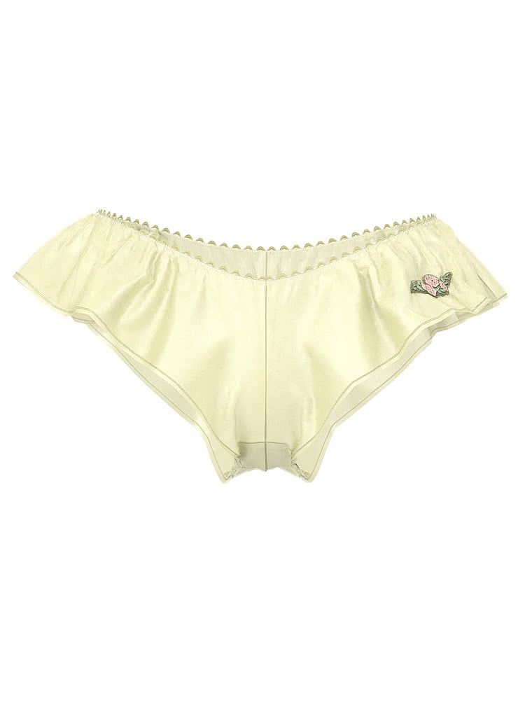 Chiloți brazilieni cu volane Sweet Melody Flutter. Produsul este galben și provine din colecția Dream Angels.