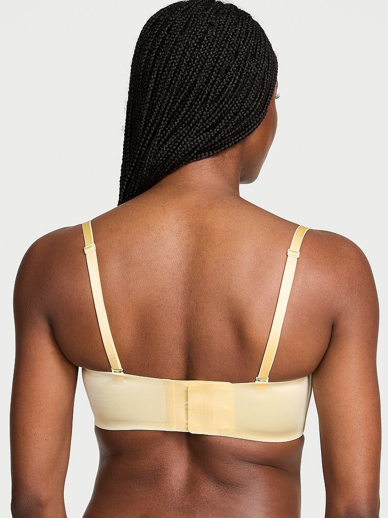 Bandeau fără bretele și sutien push-up cu sârmă. Produsul este de culoare galbenă și provine din colecția Invisible by Victoria's Secret.