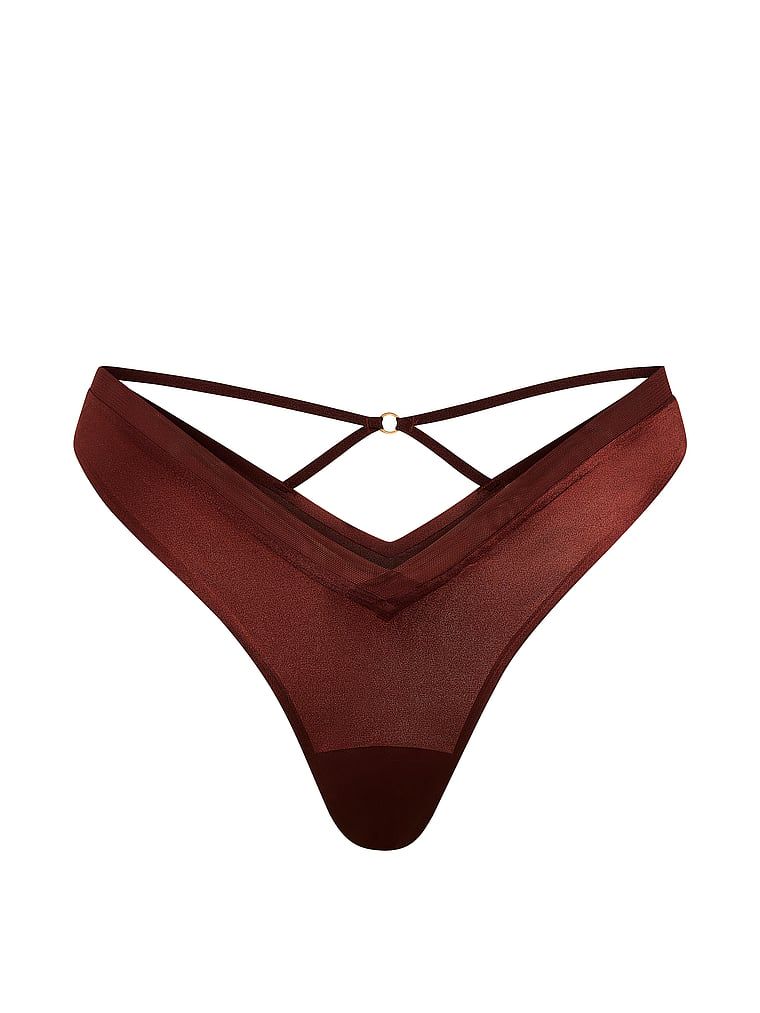 Tanga cu curele pe spatele Sheer Reveal. Produsul este modelat și provine din colecția Very Sexy.