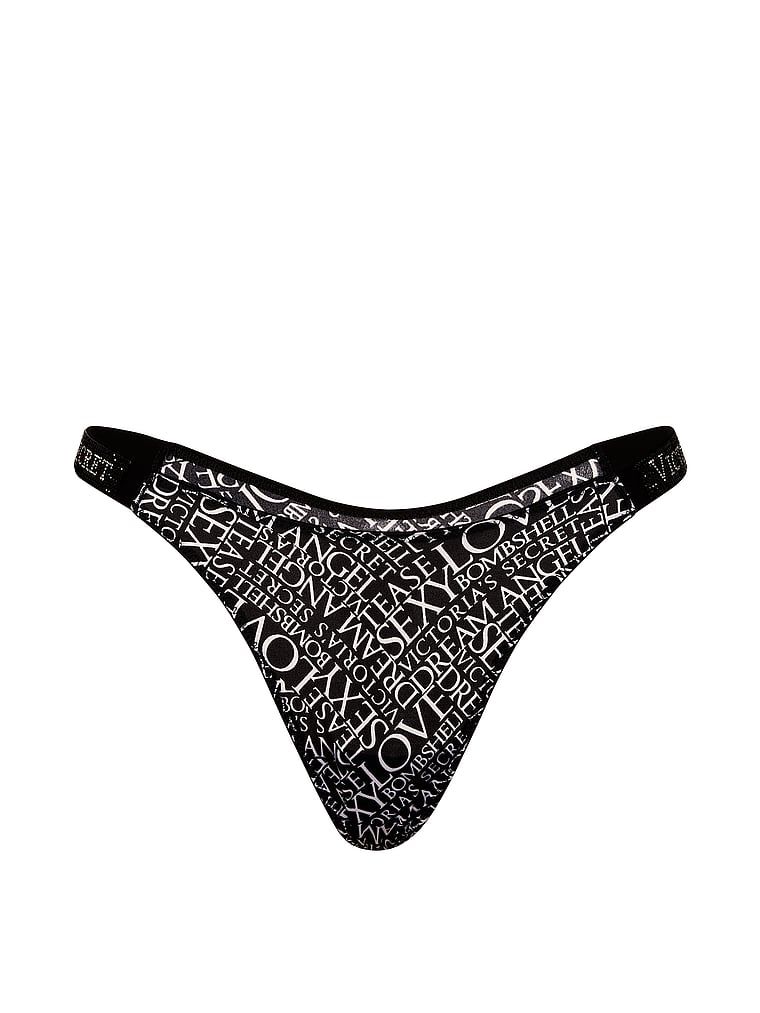 Tanga cu curele lucioase Shine Strap. Produsul are o culoare cu model și provine din colecția Very Sexy.
