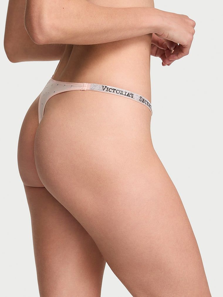 Tanga Shine Strap Dot. Produsul este roz și provine din colecția Very Sexy.