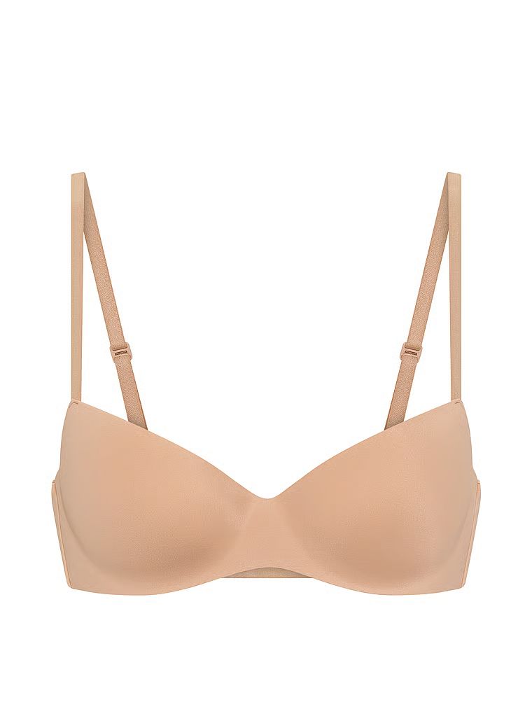 Sutien ușor căptușit, cu balconet FlexFactor. Produsul este de culoare bej și provine din colecția Body by Victoria.