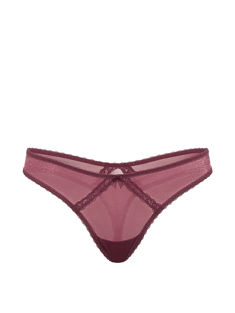 Shimmer Shimmer Shimmer Shiny Thong. Produsul este roz și provine din colecția Dream Angels.