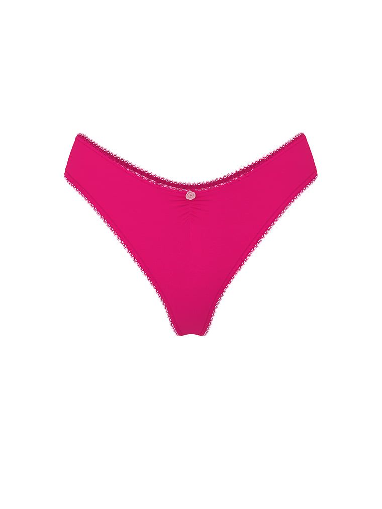 Tanga de bumbac cu plasă la spate, dantelă de inimă. Produsul este roz și provine din colecția Victoria's Secret.
