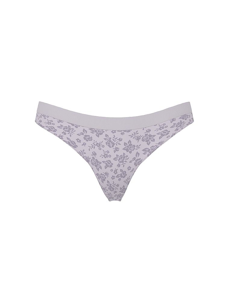 Tanga, fără cusururi, floral. Produsul are o culoare florală și provine din colecția Seamless (Seamless Collection).