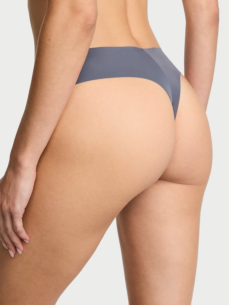 Tanga fără cusură. Produsul este de culoare gri și provine din colecția No-Show.