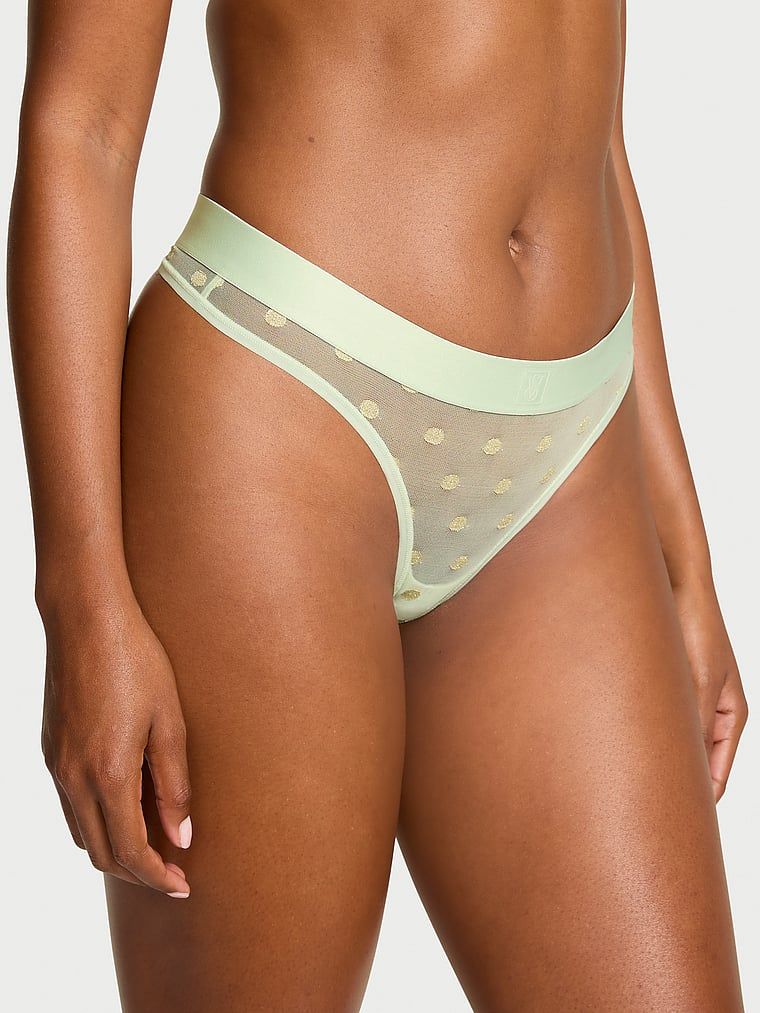 Tanga din plasă Sheer Heritage Shimmer. Produsul este de culoare aurie și provine din colecția Cottumbac.