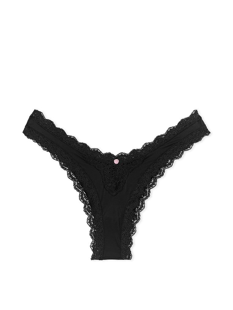 Tanga cu garnitură din dantelă. Produsul este negru și provine din colecția Dream Angels.