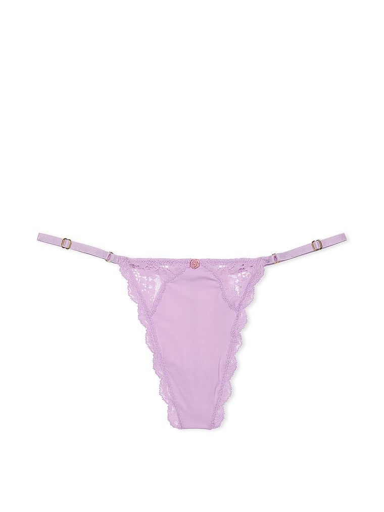 Tanga din dantelă cu bretele reglabile Lace-Trim V-String. Produsul este mov și provine din colecția Dream Angels.