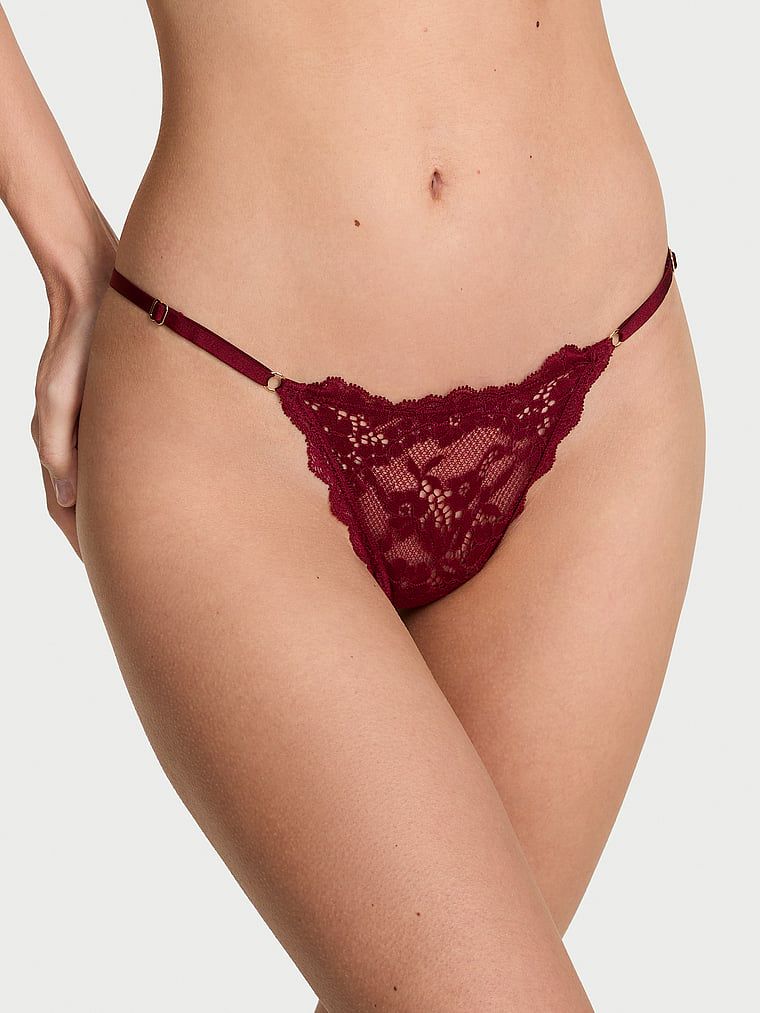 Tanga din dantelă cu curele reglabile din dantelă V-String. Produsul este de culoare roșie și provine din colecția Dream Angels.