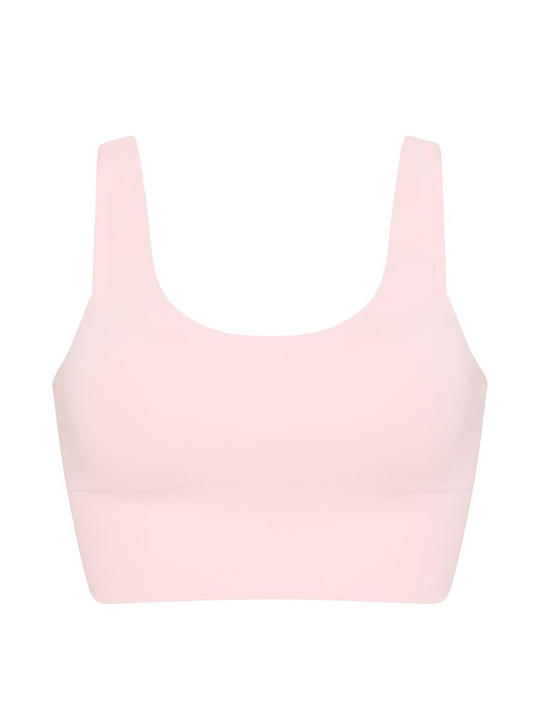 Sutien sport VSX Elevate cu un finisaj neted. Produsul este roz și provine din colecția VSX.